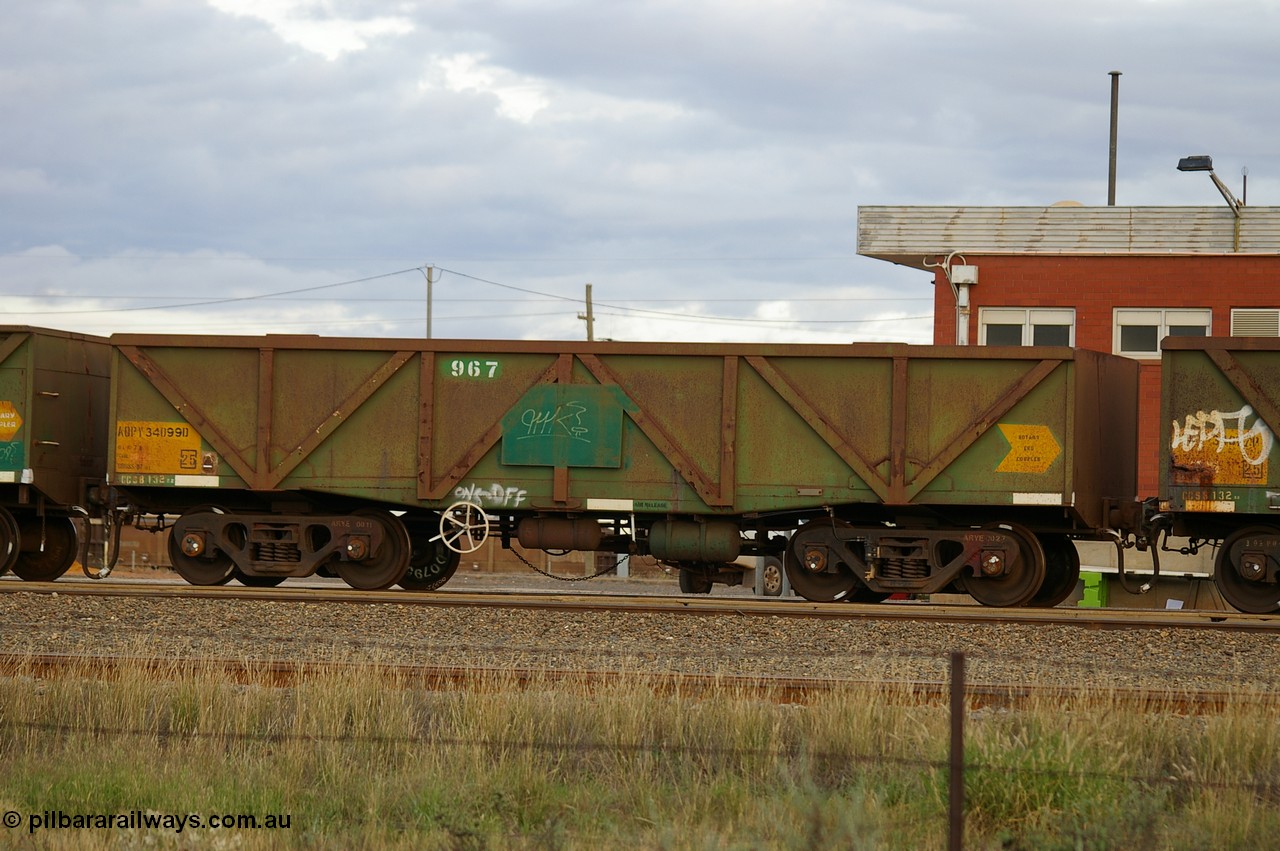 PD 12850
West Kalgoorlie, AOPY 34099 with fleet number 967 and of the drop floor type, one of seventy ex ANR coal waggons rebuilt from AOKF type by Bluebird Engineering SA in service with ARG on Koolyanobbing iron ore trains. They used to be three metres longer and originally built by Metropolitan Cammell Britain as GB type in 1952-55, seen here in a rake with sister waggons.
Keywords: Peter-D-Image;AOPY-type;AOPY34099;Bluebird-Engineering-SA;Metropolitan-Cammell-Britain;GB-type;
