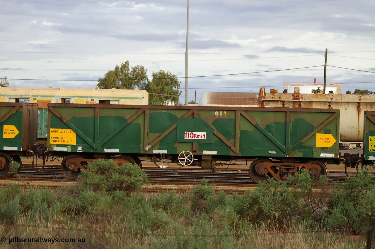 PD 12864
West Kalgoorlie, AOPY 32379 with fleet number 911, one of seventy ex ANR coal waggons rebuilt from AOKF type by Bluebird Engineering SA in service with ARG on Koolyanobbing iron ore trains. They used to be three metres longer and originally built by Metropolitan Cammell Britain as GB type in 1952-55, seen here in a rake with sister waggons.
Keywords: Peter-D-Image;AOPY-type;AOPY32379;Bluebird-Engineering-SA;Metropolitan-Cammell-Britain;GB-type;