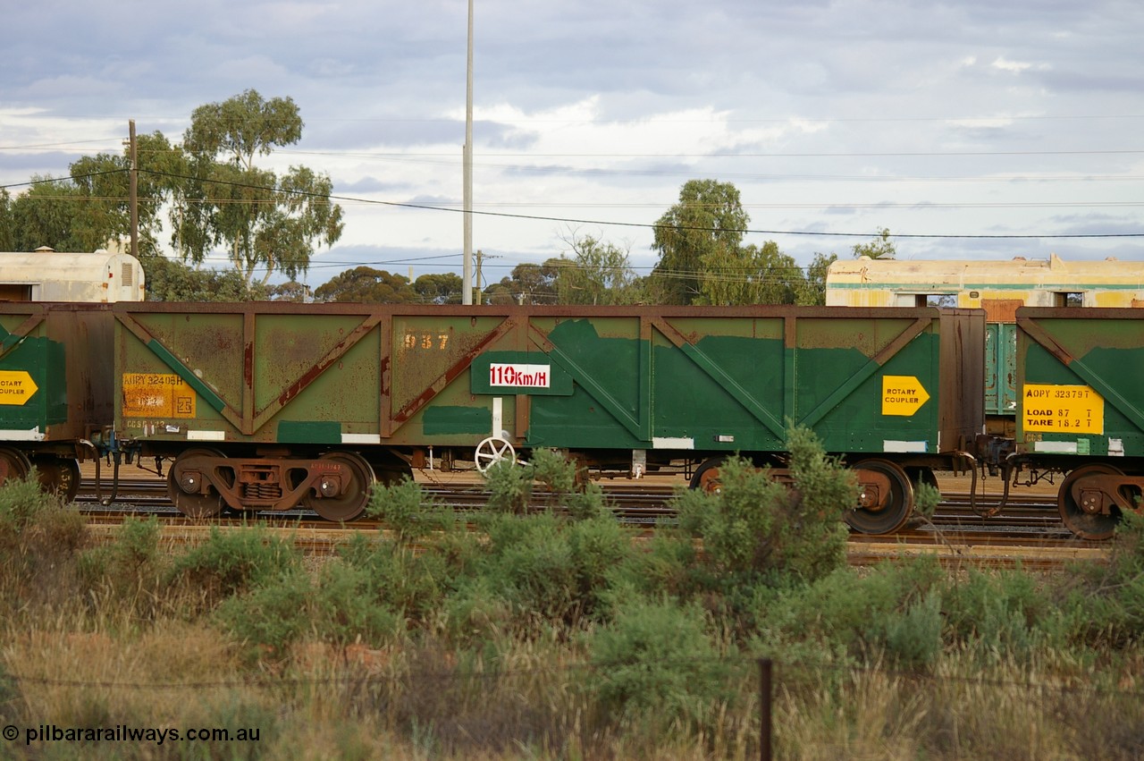 PD 12865
West Kalgoorlie, AOPY 32408 with fleet number 937, was renumbered to 4906 but the 4 has been removed, one of seventy ex ANR coal waggons rebuilt from AOKF type by Bluebird Engineering SA in service with ARG on Koolyanobbing iron ore trains. They used to be three metres longer and originally built by Metropolitan Cammell Britain as GB type in 1952-55, seen here in a rake with sister waggons.
Keywords: Peter-D-Image;AOPY-type;AOPY32408;Bluebird-Engineering-SA;Metropolitan-Cammell-Britain;GB-type;