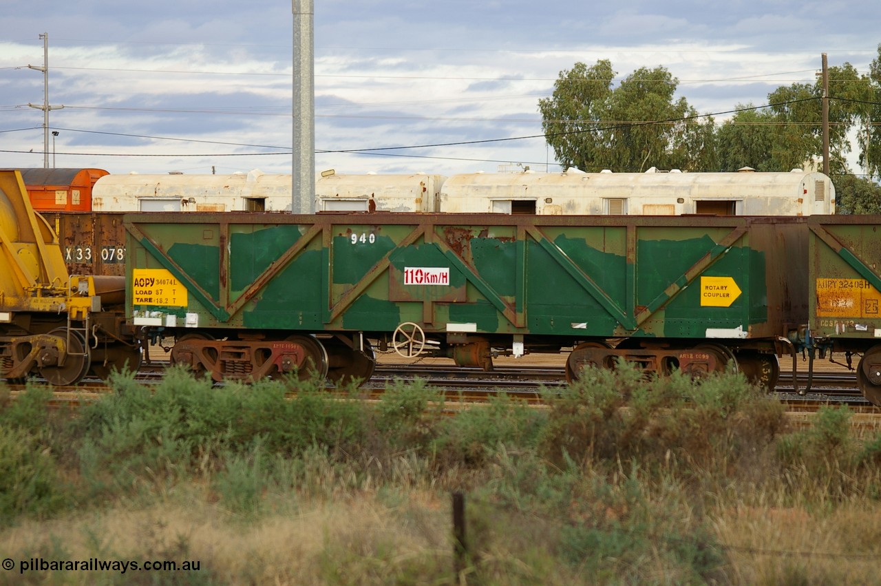 PD 12866
West Kalgoorlie, AOPY 34074 with fleet number 940, one of seventy ex ANR coal waggons rebuilt from AOKF type by Bluebird Engineering SA in service with ARG on Koolyanobbing iron ore trains. They used to be three metres longer and originally built by Metropolitan Cammell Britain as GB type in 1952-55, seen here in a rake with sister waggons.
Keywords: Peter-D-Image;AOPY-type;AOPY34074;Bluebird-Engineering-SA;Metropolitan-Cammell-Britain;GB-type;