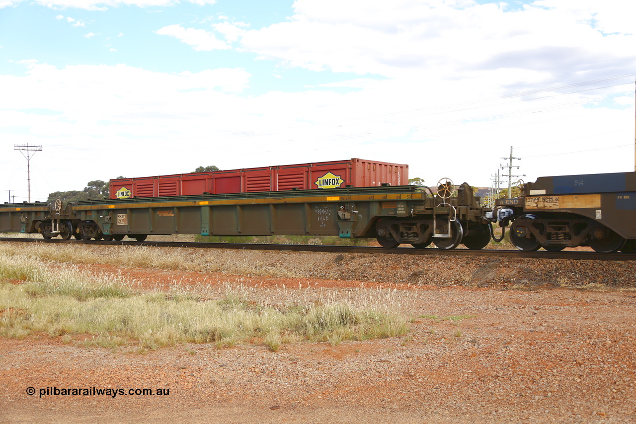 210407 9850
Parkeston, 2MP5 intermodal train, RRXY 2, platform 1 with a Linfox 40' LSDU half height side door container. The RRXY type 5-pack well waggon set is one of eleven built by Bradken Qld in 2002 for Toll from a Williams-Worley design.
Keywords: RRXY-type;RRXY2;Williams-Worley;Bradken-Rail-Qld;