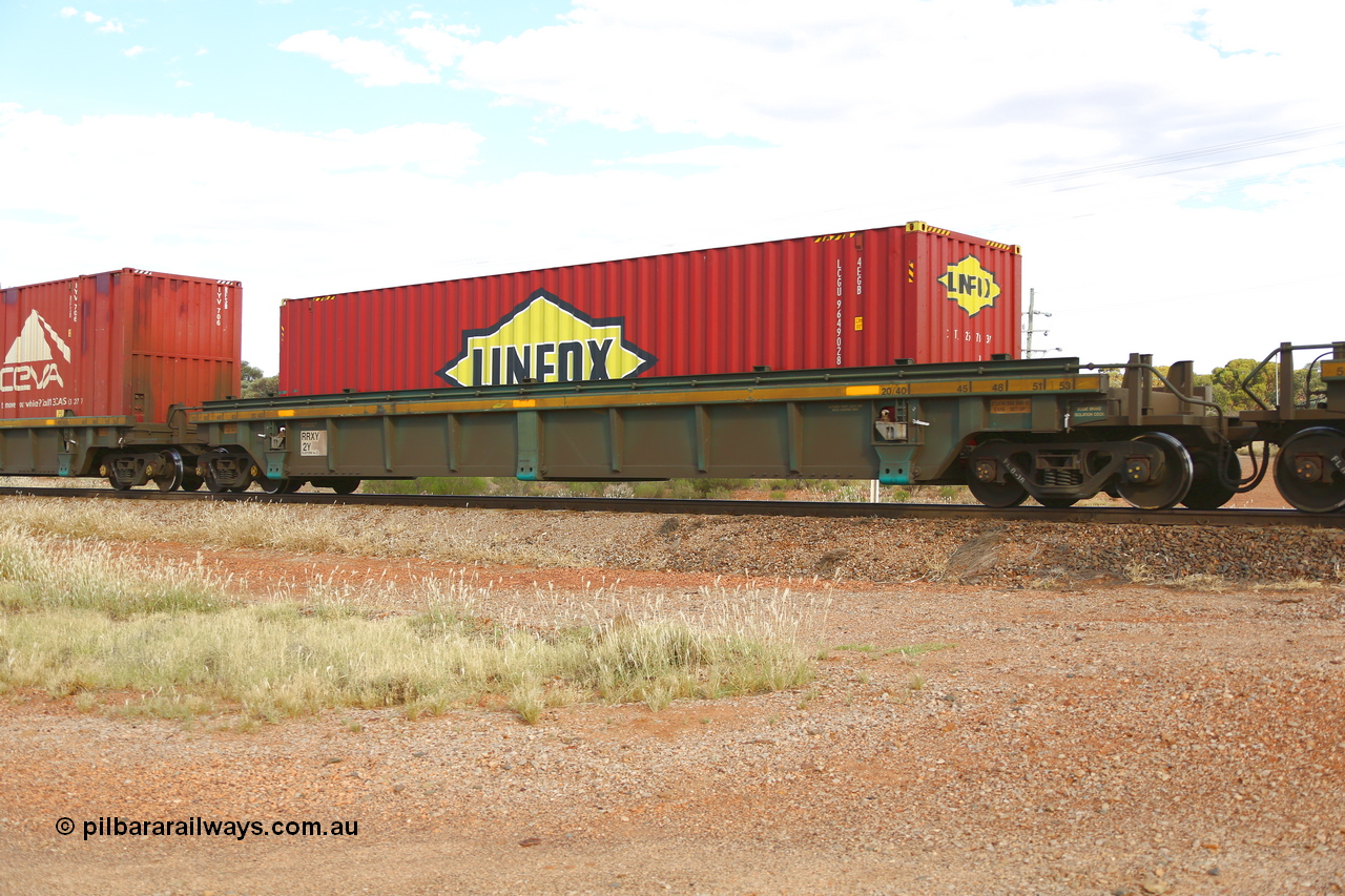 210407 9852
Parkeston, 2MP5 intermodal train, RRXY 2, platform 3 with a Linfox 4EGB type 40' container LCGU 964902. The RRXY type 5-pack well waggon set is one of eleven built by Bradken Qld in 2002 for Toll from a Williams-Worley design.
Keywords: RRXY-type;RRXY2;Williams-Worley;Bradken-Rail-Qld;