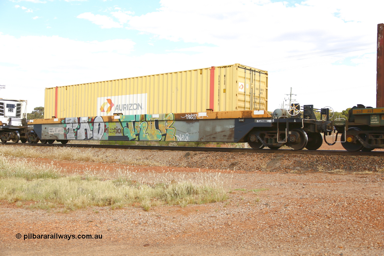 210407 9855
Parkeston, 2MP5 intermodal train, RQZY 7062, platform 1 with an Aurizon 48' MFGB type container AEHQ 100610. The RQZY type is a five unit bar coupled well container waggon built as one of a batch of thirty two by Goninan NSW for National Rail in 1995/96.
Keywords: RQZY-type;RQZY7062;Goninan-NSW;