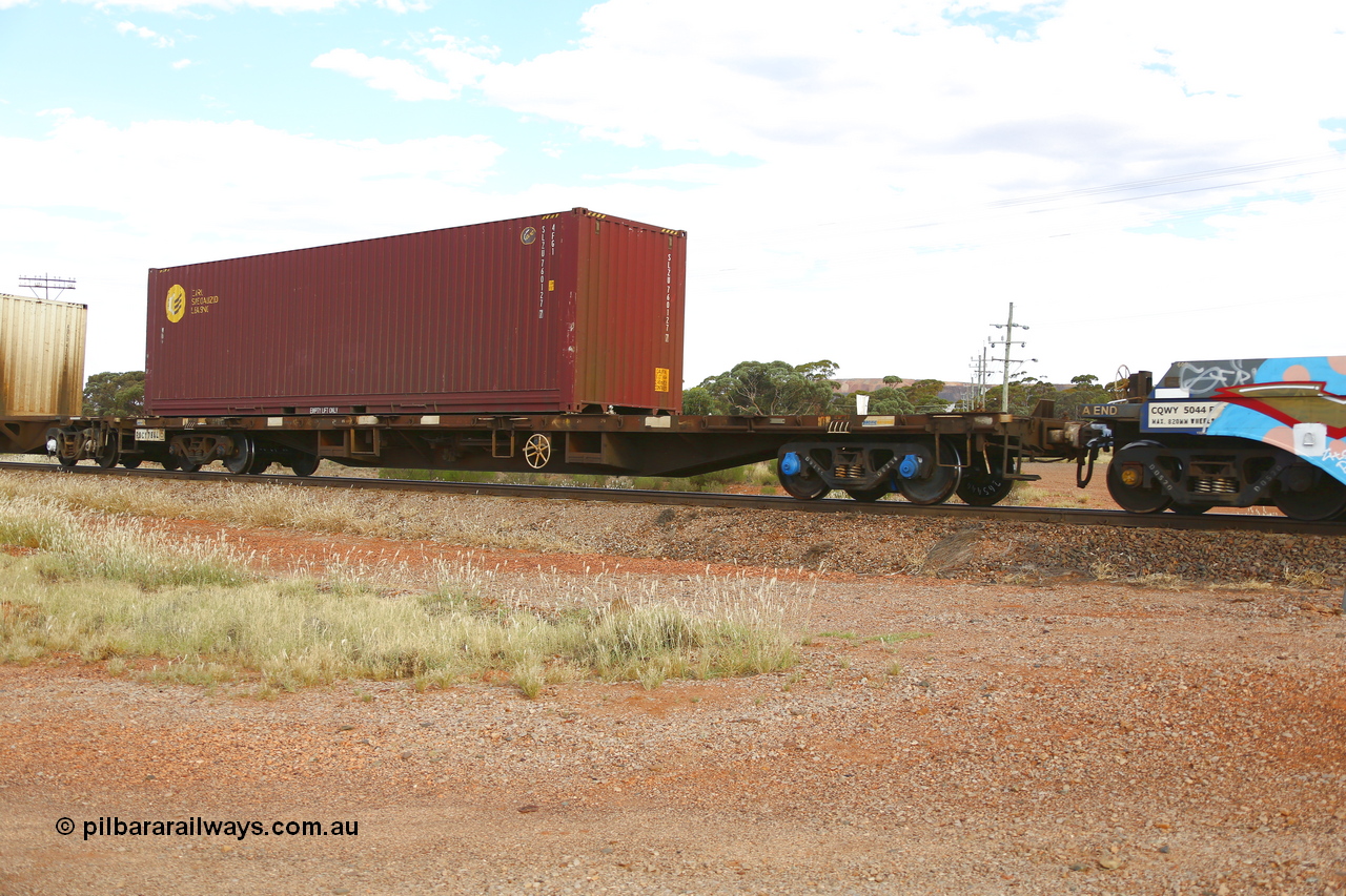 210407 9869
Parkeston, 2MP5 intermodal train, RQCY type flat waggon RQCY 784, originally built by the Victorian Railways Newport Workshops as an FQX type in 1973 in a batch of one hundred and twenty five. Recoded to VQCX in 1979, to RQCX in 1994, to National Rail in 1995 and recoded to RQCY. Loaded with a CARU Specialized Leasing 40' 4FG1 type container SLZU 760127.
Keywords: RQCY-type;RQCY784;Victorian-Railways-Newport-WS;FQX-type;VQCX-type;RQCX-type;