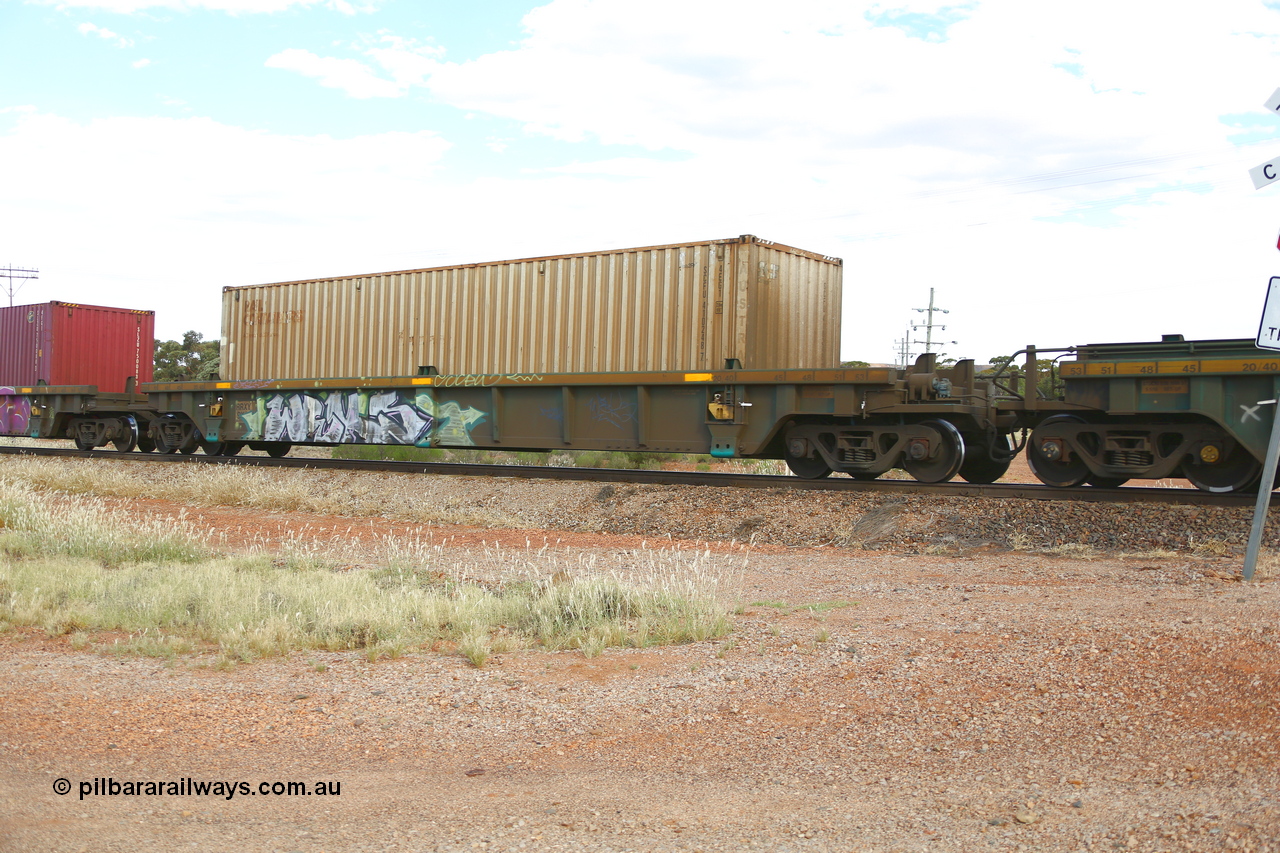 210407 9873
Parkeston, 2MP5 intermodal train, RRXY 9, platform 3 with an SCF Rail Containers 40' 4EG1 type container SCFU 410248 with Austrans. The RRXY type 5-pack well waggon set is one of eleven built by Bradken Qld in 2002 for Toll from a Williams-Worley design.
Keywords: RRXY-type;RRXY9;Williams-Worley;Bradken-Rail-Qld;