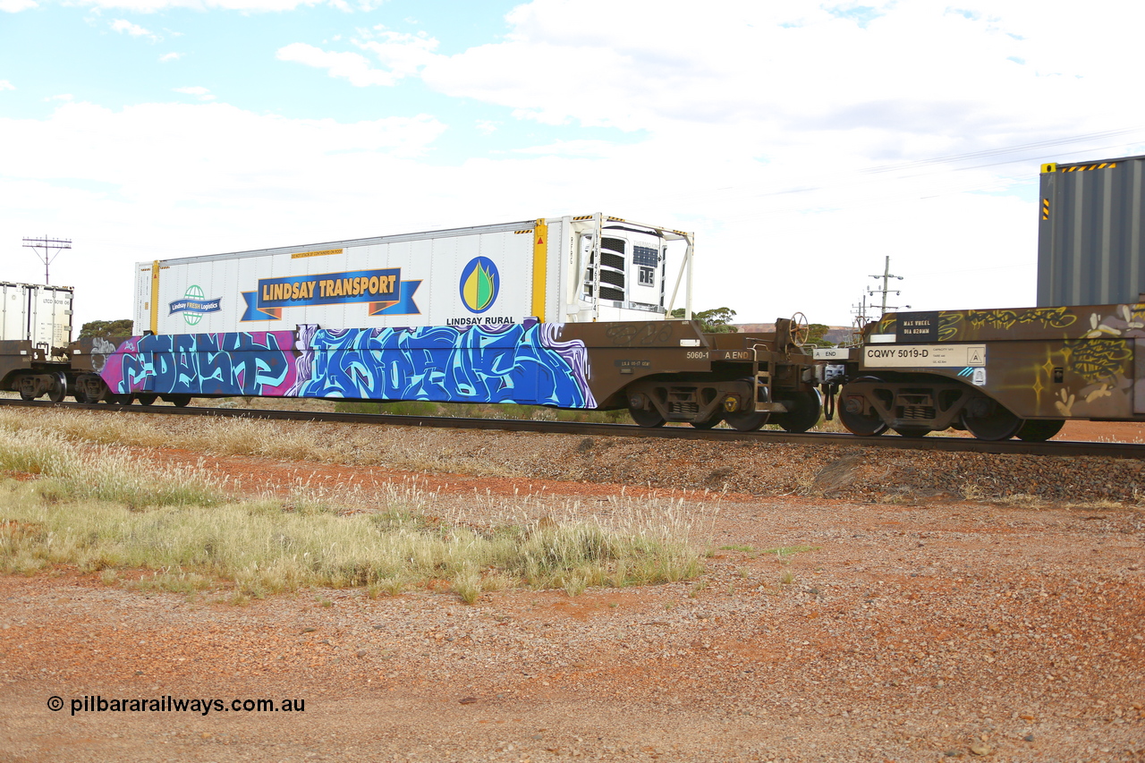 210407 9893
Parkeston, 2MP5 intermodal train, CQWY type well waggon CQWY 5060 well 1, the final set of well waggon pairs were built by Bluebird Rail Operations SA in a batch of sixty pairs in 2008 for CFCLA. Loaded with an RFRG 46' 6
