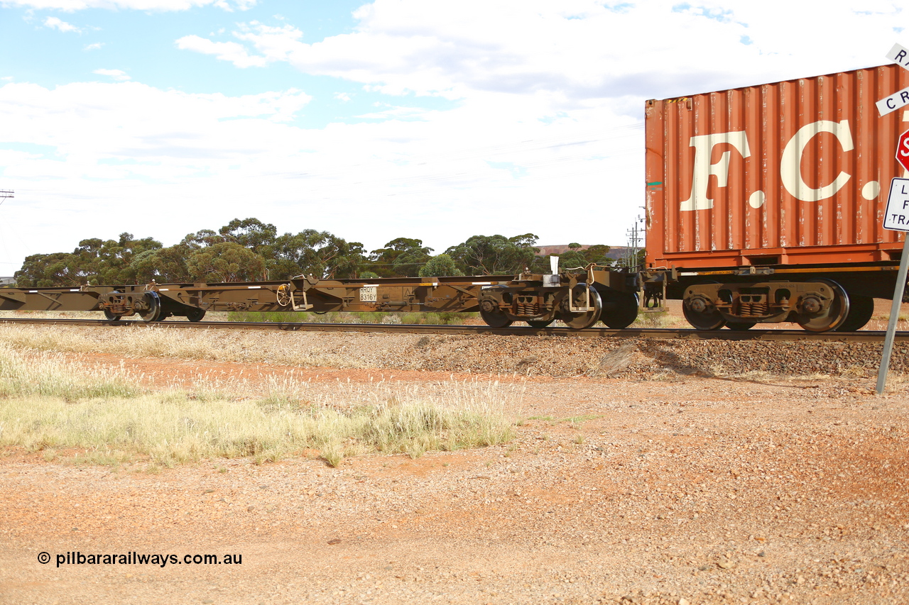 210407 9904
Parkeston, 2MP5 intermodal train, RRQY type articulated five-unit container waggon set RRQY 8316 platform 1, built by Qiqihar Rollingstock Works in China as part of a forty one unit order in 2005/06 for Pacific National.
Keywords: RRQY-type;RRQY8316;Qiqihar-Rollingstock-Works-China;