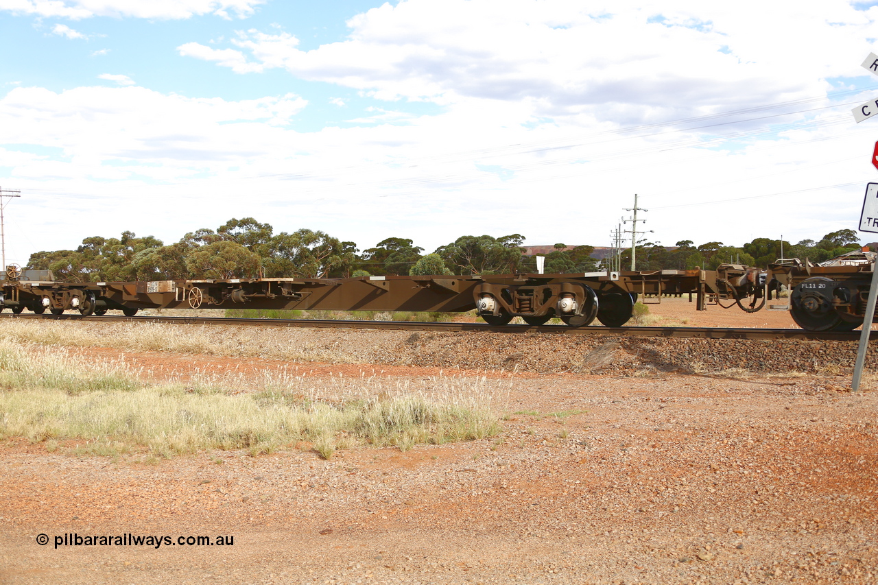 210407 9909
Parkeston, 2MP5 intermodal train, RQJW type jumbo container waggon RQJW 21976, originally built by Mittagong Engineering NSW in 1980 as the first waggon of a batch of twenty JCW 80' jumbo container waggons. Recoded to NQJW then to National Rail as RQJW in 1994.
Keywords: RQJW-type;RQJW21976;Mittagong-Engineering-NSW;JCW-type;NQJW-type;
