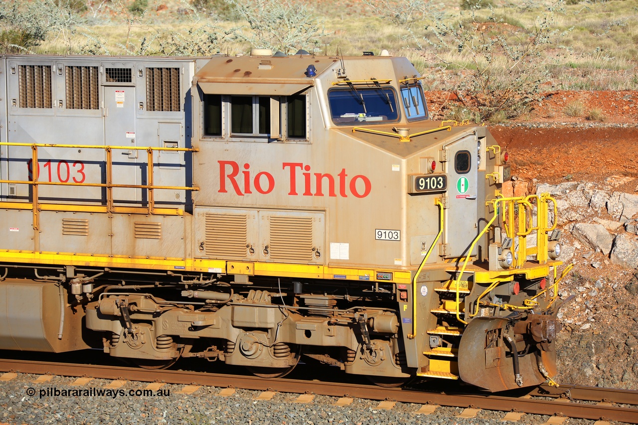 180616 1657
Cooya Pooya, 32 km on the Cape Lambert line, Rio Tinto loco 9103 with serial 61941 a GE Erie built GE model ES44ACi from the 1st order in Rio Tinto Stripes livery is 'tied down' to the mainline following a total loss of air, the locomotive's hose bag can be seen chained to the rail in case of movement. The train pulled a coupling around the 45 car position. 16th June 2018. [url=https://goo.gl/maps/ckyFypg4LAy]Geodata[/url]
Keywords: 9103;GE;ES44ACi;61941;Rio-Tinto-Stripes;