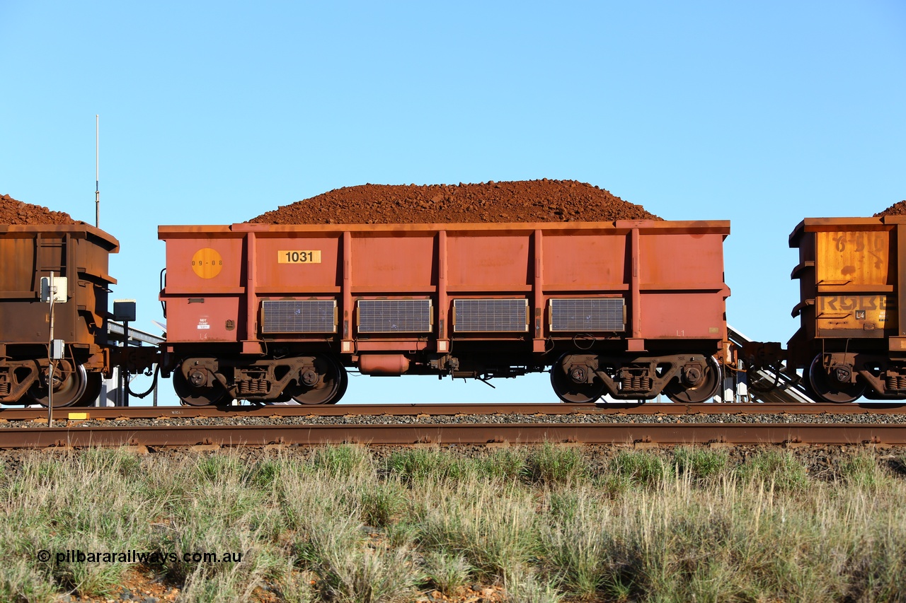 180616 1679
Cooya Pooya, instrumented ore waggon 1031, part of a second batch of extra 'J' waggons built by Bradken in September 2008 and painted rather than the plain steel finish. Solar panels adorn the waggon sides. 16th June 2018. [url=https://goo.gl/maps/PW31kLARES92]GeoData[/url].
Keywords: 1031;Bradken-NSW;