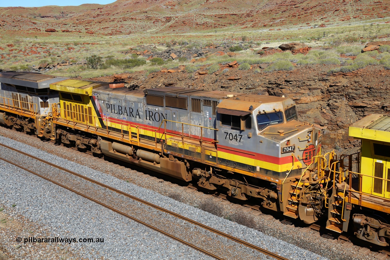 180616 1773
At the 81 km on the Tom Price West mainline, Rio Tinto loco 7047 with serial 57098 a GE Erie built GE model Dash 9-44CW from the 10th order in HI Pilbara Iron livery with heavy rust on the visor, was built in August 2006. 16th June 2018.
Keywords: 7047;GE;Dash-9-44CW;57098;HI-Pilbara-Iron;