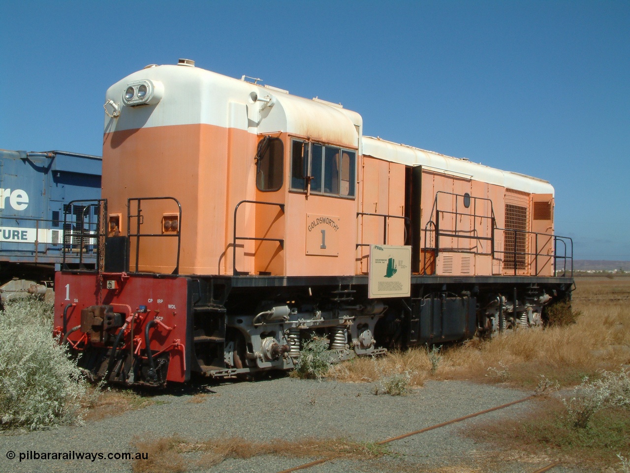 050109 092824
Pilbara Railways Historical Society, Goldsworthy Mining Ltd B class unit 1, an English Electric built ST95B model, originally built in 1965 serial A-104, due to accident damage rebuilt on new frame with serial A232 in 1970. These units of Bo-Bo design with a 6CSRKT 640kW prime mover and built at the Rocklea Qld plant. 9th October 2005.
Keywords: B-class;English-Electric-Qld;ST95B;A-104;A-232;GML;Goldsworthy-Mining;