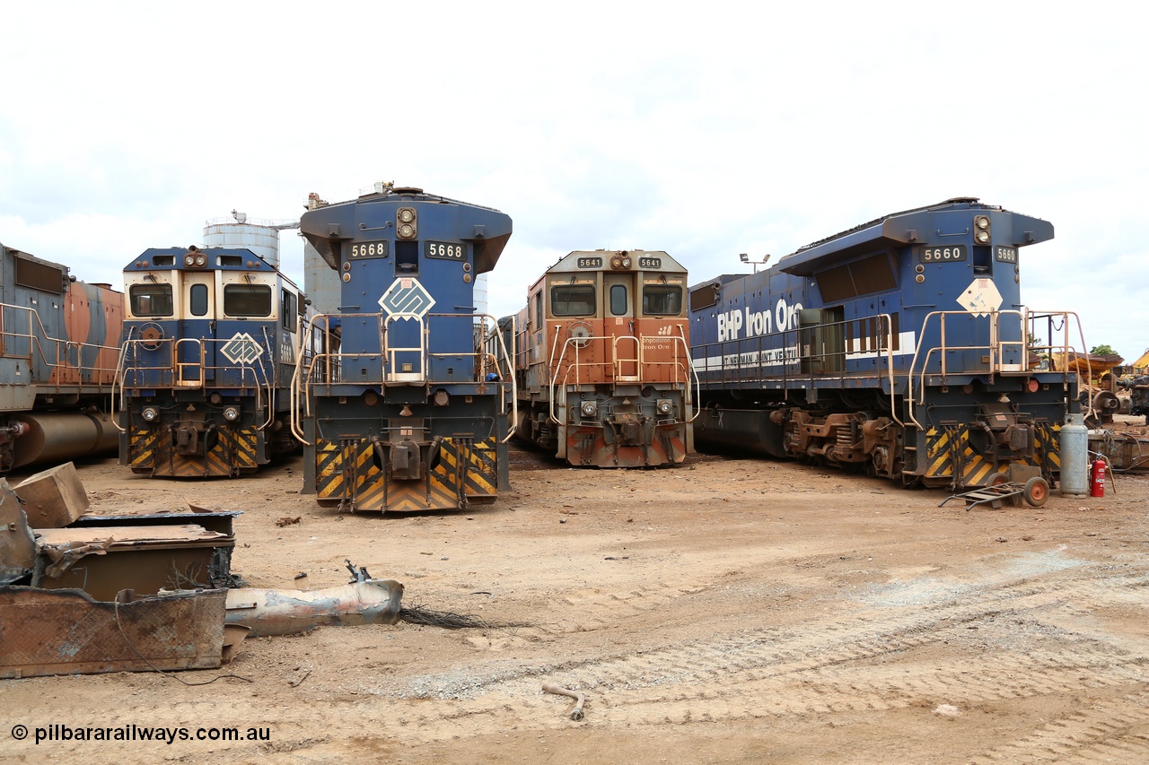 160128 00384
Wedgefield, Sims Metal yard, another line up with the front and back views of two Goninan rebuild models CM40-8MEFI 5669 and 5668 and two CM40-8M models 5641 and 5660, again the only differences are no marker lights on 5641 and it has a snow plough.
Keywords: CM40-8M;Goninan;GE;