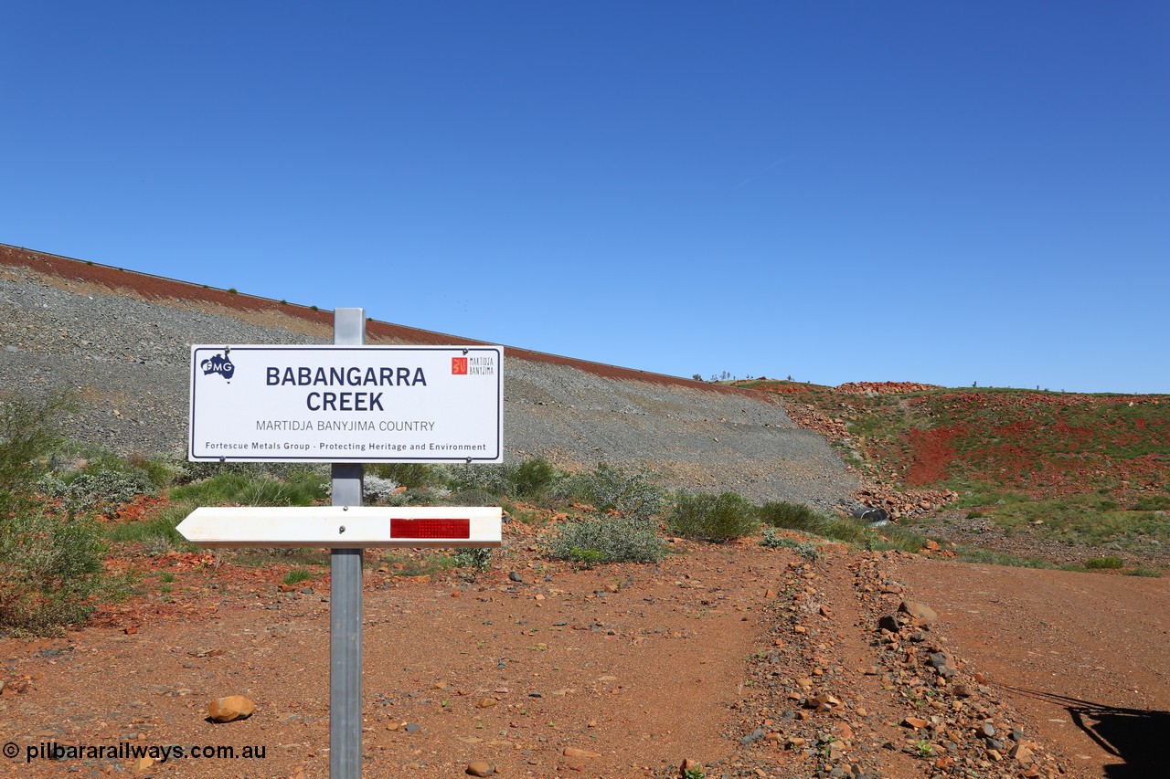 150505 7937
FMG Solomon Line, looking east across earth fill abutment with culverts, sign indicating Babangarra Creek. Geodata: [url=https://goo.gl/maps/wRgVPLkhjnw] -22.0522533 118.7402133 [/url].
