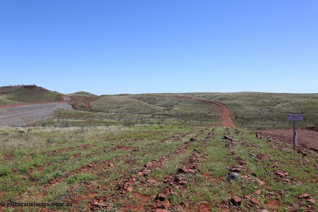 150505 7942
FMG Solomon Line, looking east, earth fill abutment embankment for rail line, Jingarri Creek, expanded view from 7940, shows access road. Geodata: [url=https://goo.gl/maps/PCJ1fDRmspu] -22.0545750 118.7278517 [/url].
