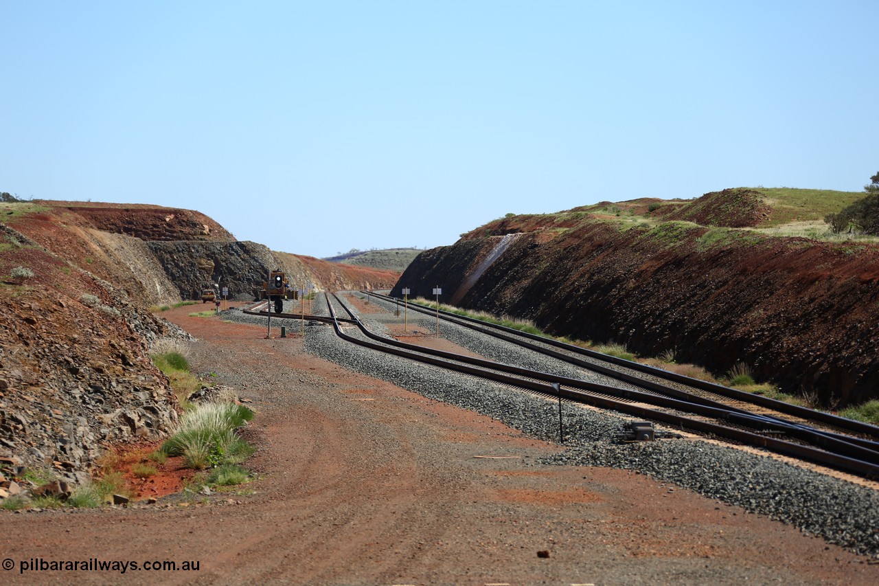 150505 7994
FMG Solomon Line, zoom view looking west from the east end of Bow Siding, point indicator indicating the loop is set for the straight, back track machine in it, 233 km. Geodata: [url=https://goo.gl/maps/uDTApXBKymD2] -22.0188283 118.5297867 [/url].
