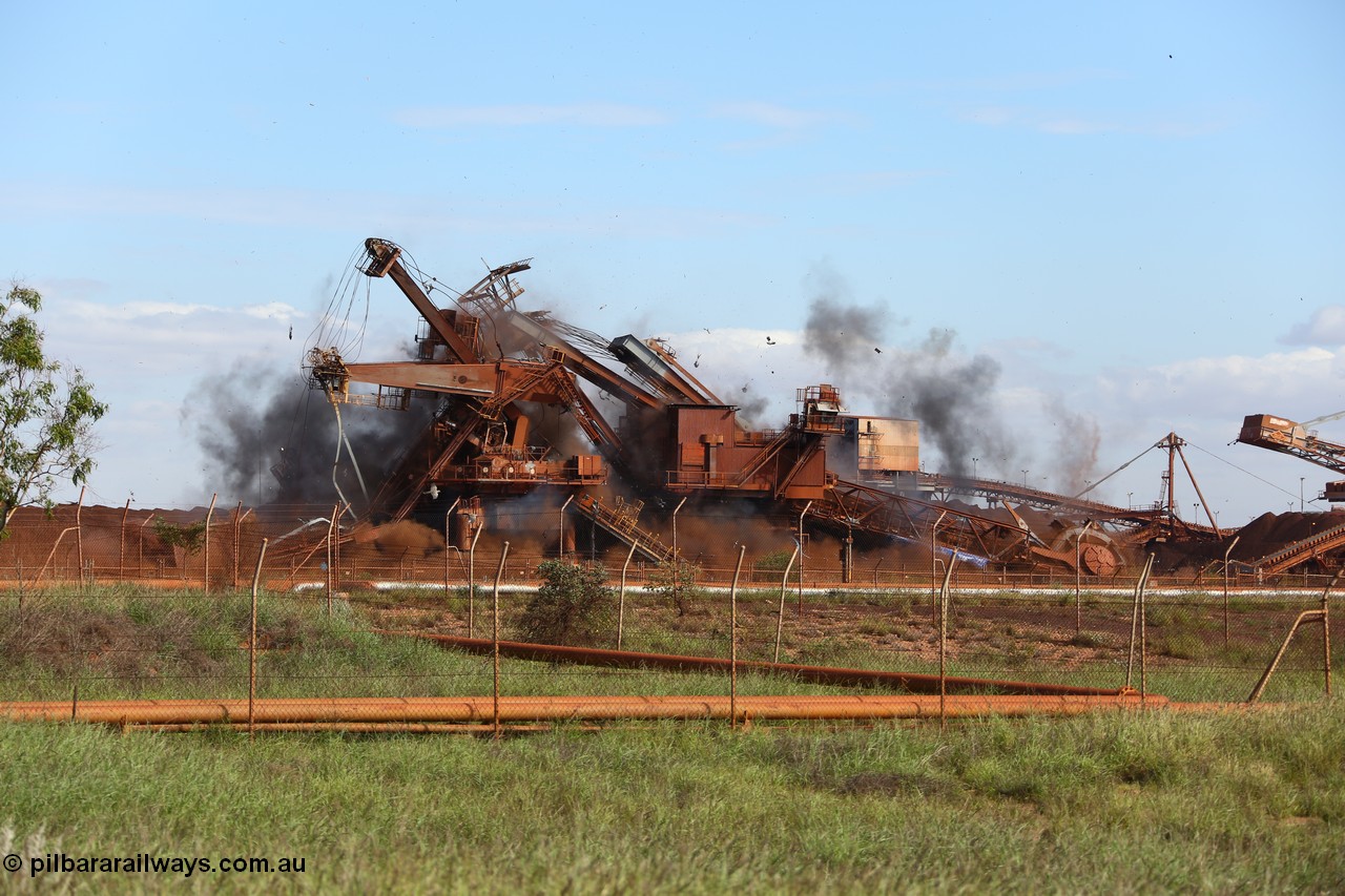 150518 8123
BHP Iron Ore old and retired ore stacker #4 and bucket wheel reclaimer #4 are blown apart to aid in the scrapping process.
