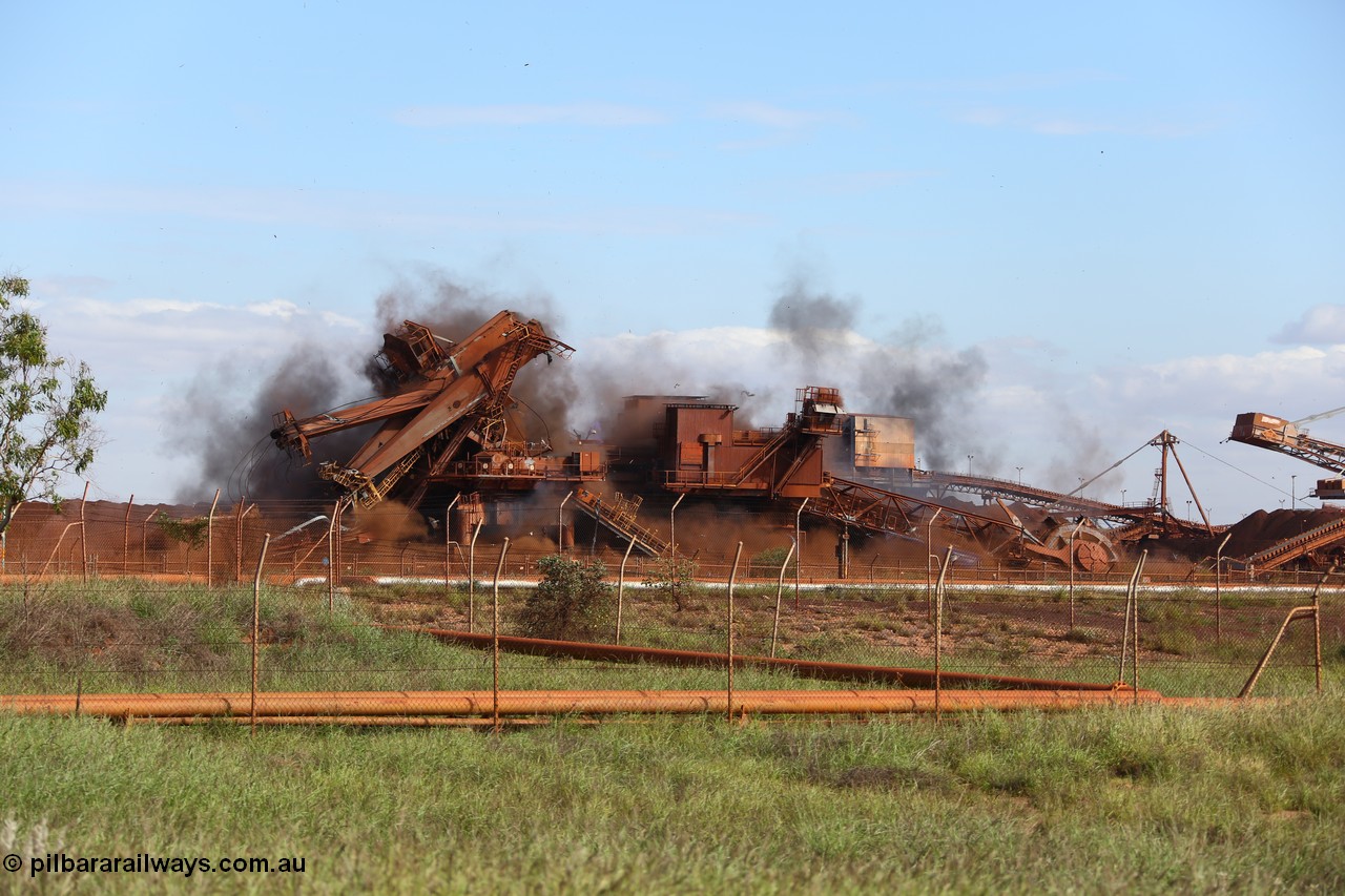 150518 8125
BHP Iron Ore old and retired ore stacker #4 and bucket wheel reclaimer #4 are blown apart to aid in the scrapping process.
