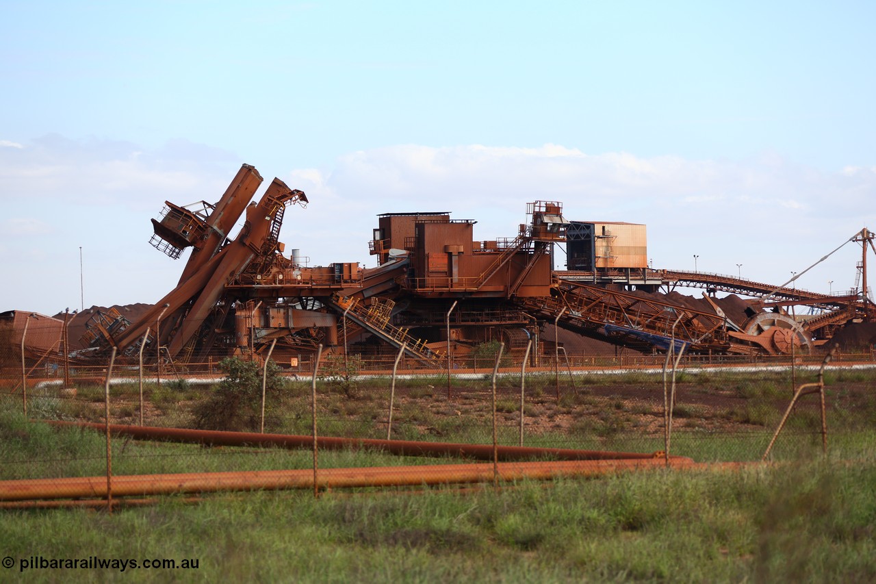 150518 8143
BHP Iron Ore old and retired ore stacker #4 and bucket wheel reclaimer #4 are blown apart to aid in the scrapping process.
