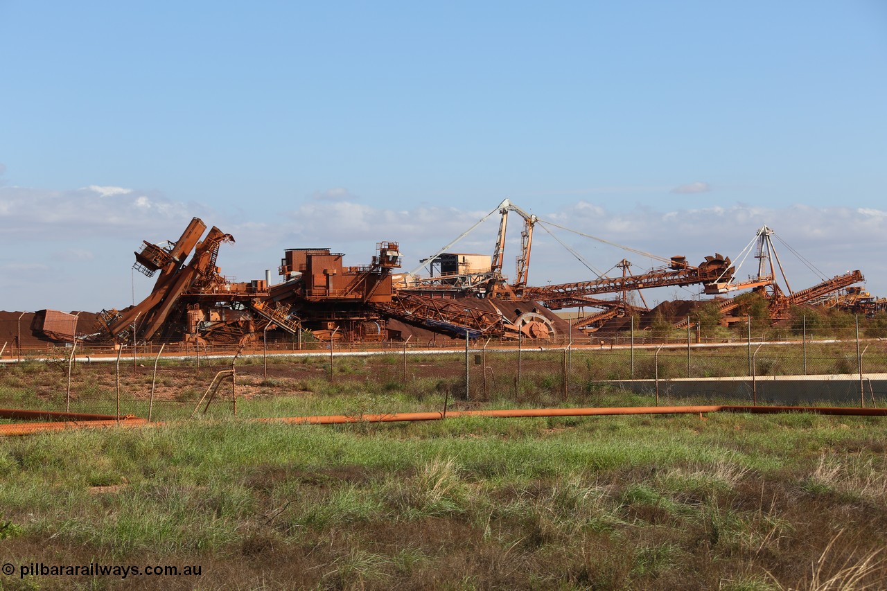 150518 8149
BHP Iron Ore old and retired ore stacker #4 and bucket wheel reclaimer #4 are blown apart to aid in the scrapping process.
