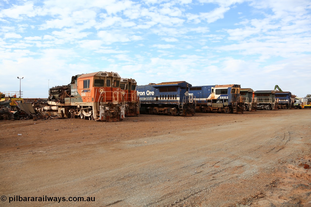 150522 8162
Wedgefield, Sims Metal yard, the first batch of BHP Billiton Dash 8 locos to be scrapped, 5646 serial 8244-11/92-135 one of a pair of new Goninan WA built CM40-8 units has already had most of the hood removed and the V16 7FDL prime mover is visible. To right are units 5647, 5657, 5656, 5663, 5635, 5645, 5649, 5638, 5640 and 5659.
Keywords: 5646;Goninan;GE;CM40-8;8244-11/92-135;