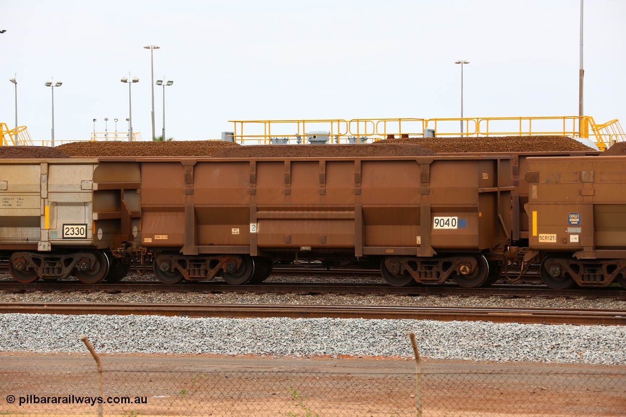 150523 8245
Nelson Point Yard, loaded ore waggon 9040, a Golynx style waggon built by Goninan in 2005 with asset number of 203485 out of 5Cr12Ti stainless steel which does away with the need to paint the waggon interiors to prevent wear.
Keywords: Goninan-WA;Golynx;BHP-ore-waggon;