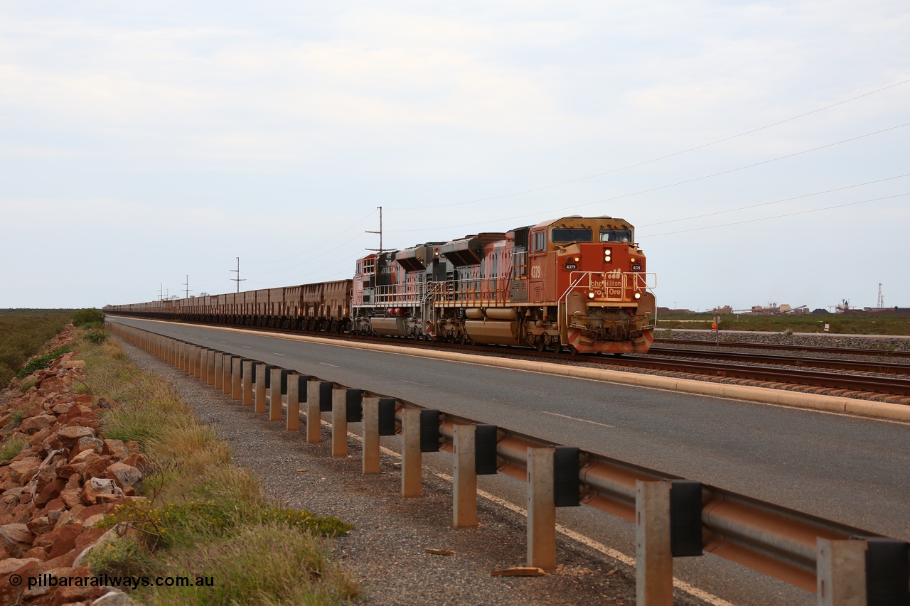 150523 8265
Finucane Island, empty train heading back to Boodarie behind Progress Rail EMD SD70ACe unit 4379 serial 20108424-006 and a newly arrived and named sibling 4474 'Raymond White' serial 20148001-007. Geodata: [url=https://goo.gl/maps/3oDrc9JAS762] -20.3341700 118.5504083 [/url].
Keywords: 4379;Progress-Rail-Muncie-USA;EMD;SD70ACe;20108424-006;