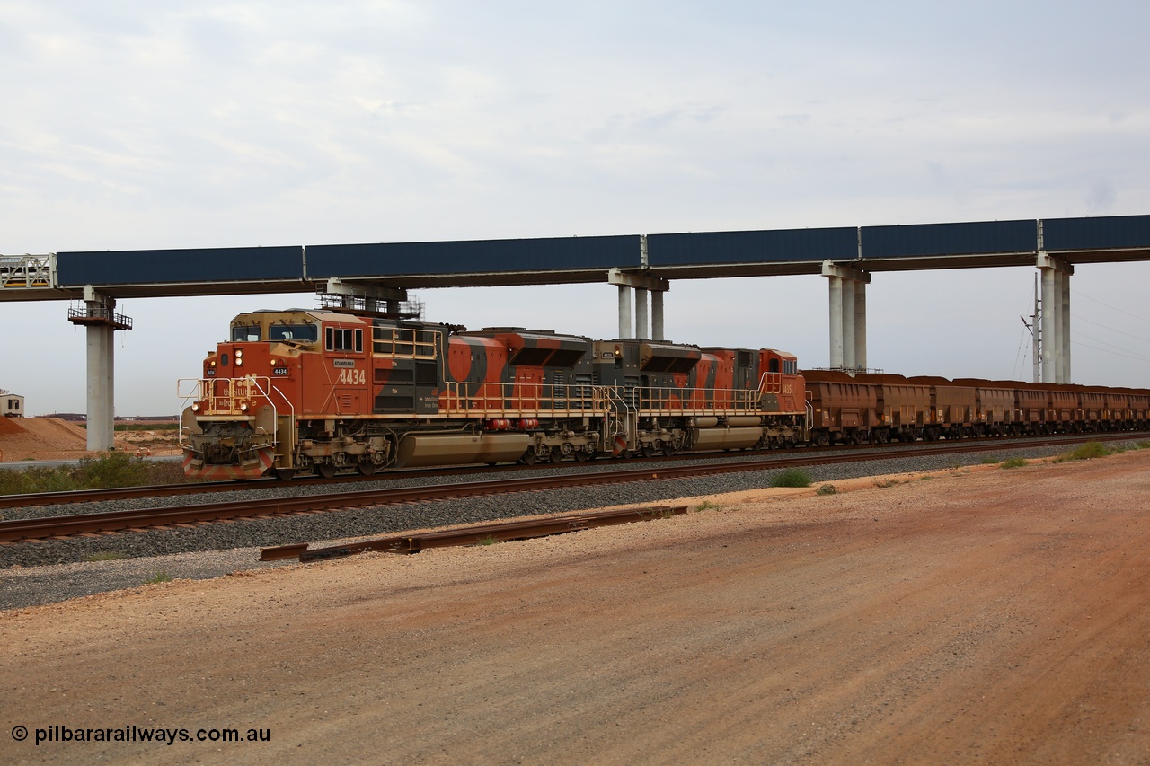 150523 8274
Finucane Island, loaded train arriving at the Island behind Progress Rail SD70ACe unit 4434 'Koombana' serial 20128866-003 and same batch sibling 4435 serial 20128866-004 train is running under new Roy Hill conveyor and road bridge. Geodata: [url=https://goo.gl/maps/c1KCYY62oRx] -20.3363383 118.5497850 [/url].
Keywords: 4434;Progress-Rail-Muncie-USA;EMD;SD70ACe/LCi;20128866-003;