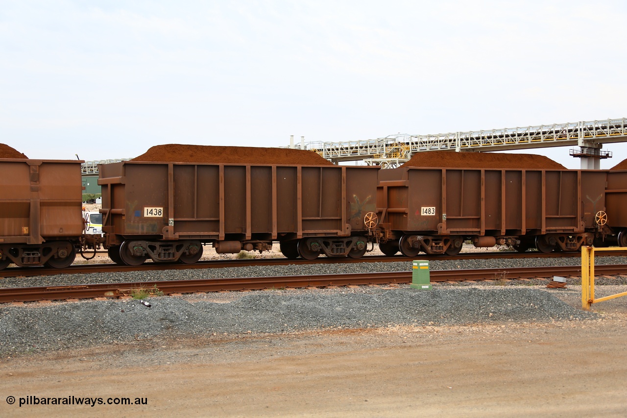 150523 8279
Finucane Island, a pair of Yandi Fines loaded Comeng built original style ore waggons, numbers 1438 and 1483 both date from a couple of orders from 1974. Both waggons have had the end sills filled in as a capacity improvement and both show signs of having been re-sheeted and repaired. 1483 is riding on light weight 38 tonne bogies. Geodata: [url=https://goo.gl/maps/HUaomivQnAw] -20.3363567 118.5497550 [/url].
Keywords: Comeng-WA;BHP-ore-waggon;