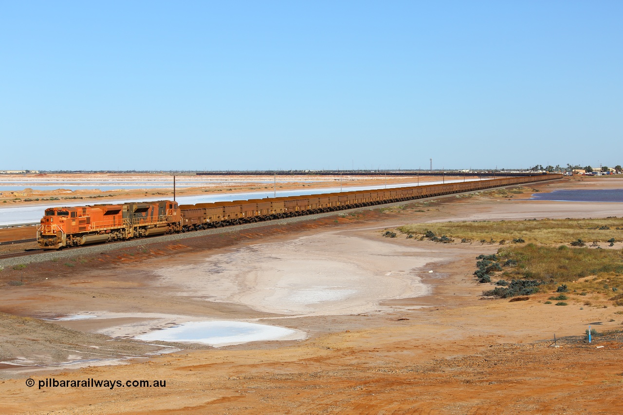 170726 9424
Redbank on the edge of Nelson Point, a loaded BHP iron ore train from Yandi arrives on the west mainline behind Electro Motive built SD70ACe unit 4331 'Withnell' serial 20066862-060 leading an SD70ACe/LC with another two SD70ACe/LC units in the middle of the 264 waggon consist. 26th July 2017.
Keywords: 4331;Electro-Motive-London-Ontario;EMD;SD70ACe;20066862-060;