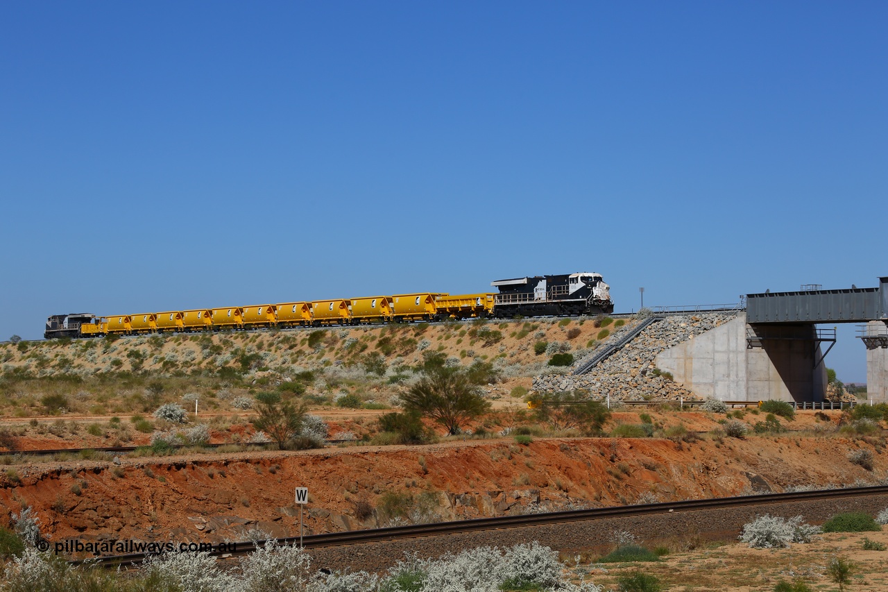 170727 9627
Woodstock Siding, a Roy Hill ballast train works north as it is about to cross BHP's Woodstock running lines, General Electric Erie built model ES44ACi unit RHA 1006 serial 62578 leads a side dump, ten ballast hoppers and a ballast plough with a sister unit on the rear. 27th July 2017. [url=https://goo.gl/maps/peEKeGz9sKS2]GeoData[/url].
Keywords: RHA-class;RHA1006;GE;ES44ACi;62578;
