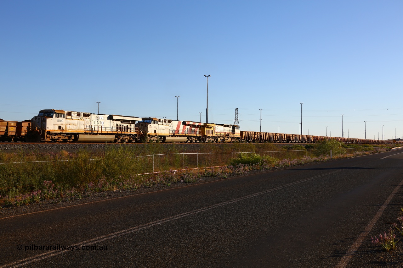 170728 09682
Cape Lambert South Yard, and empty train await departure time behind Rio Tinto 8109 serial 58005 a General Electric built ES44DCi unit with sister 8178 in Rio stripes and stablemate 9433. 28th July 2017. [url=https://goo.gl/maps/2nTd3LLrfBR2]GeoData[/url].
Keywords: 8109;GE;ES44DCi;58005;