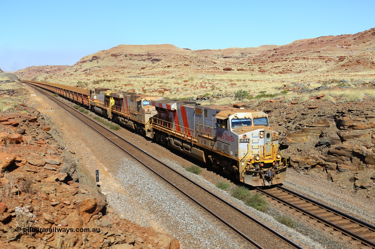 170728 09805
Emu Siding, a loaded train rolls down grade at the 81 km West Mainline behind Rio Tinto stripe liveried General Electric built ES44DCi unit 8144 serial 58725 and sister and final unit 8199 and a Dash 9-44CW stablemate 9403. 28th July 2017. [url=https://goo.gl/maps/h82NfgWLwnq]GeoData[/url].
Keywords: 8144;GE;ES44DCi;58725;