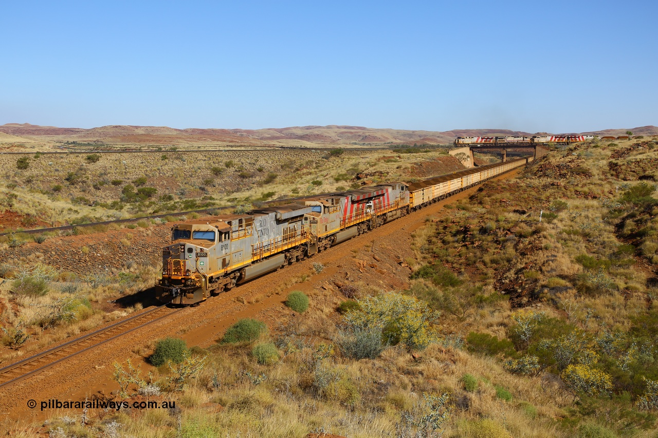 170728 09855
Western Creek - Emu area, Rio Tinto's General Electric built ES44DCi class leader 8100 serial 57996 leads two sister units, in 8176 and 8143 both in the later Rio Tinto stripe livery, with a loaded train running down from Emu Siding on the line to Dampier. The disabled Mesa A train is still on the bridge, the line to the left of the loaded is the Robe River Western Creek - Emu interconnecting line. 28th July 2017. [url=https://goo.gl/maps/vvUWXEgppNM2]GeoData[/url].
Keywords: 8100;GE;ES44DCi;57996;