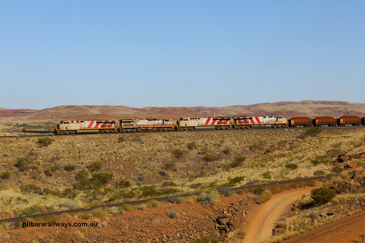 170728 09895
Western Creek, the disabled Mesa A train gets underway with relief power from General Electric built ES44DCi unit 8137 serial 59140 and Dash 9-44CW unit 7082 as the operate the train with the two ES44ACi units isolated. An empty train can be seen climbing the grade up through Emu. 28th July 2017. [url=https://goo.gl/maps/vvUWXEgppNM2]GeoData[/url].
Keywords: 8137;GE;ES44DCi;59140;
