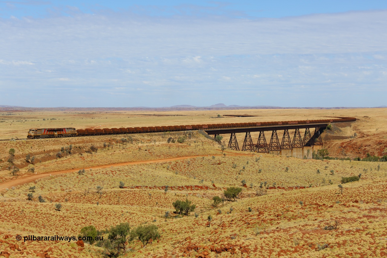 170729 0172
Fortescue River Bridge on the Robe River line at the 115.8 km, a loaded Deepdale train heading for Cape Lambert behind the standard motive power for this line, double General Electric built ES44ACi units, 9114 serial 62545 and sister unit 9101 serial 61939 run over the largest rail bridge in the Pilbara. 29th July 2017. [url=https://goo.gl/maps/urXsiFNXfiz]GeoData[/url].
Keywords: 9114;GE;ES44ACi;62545;