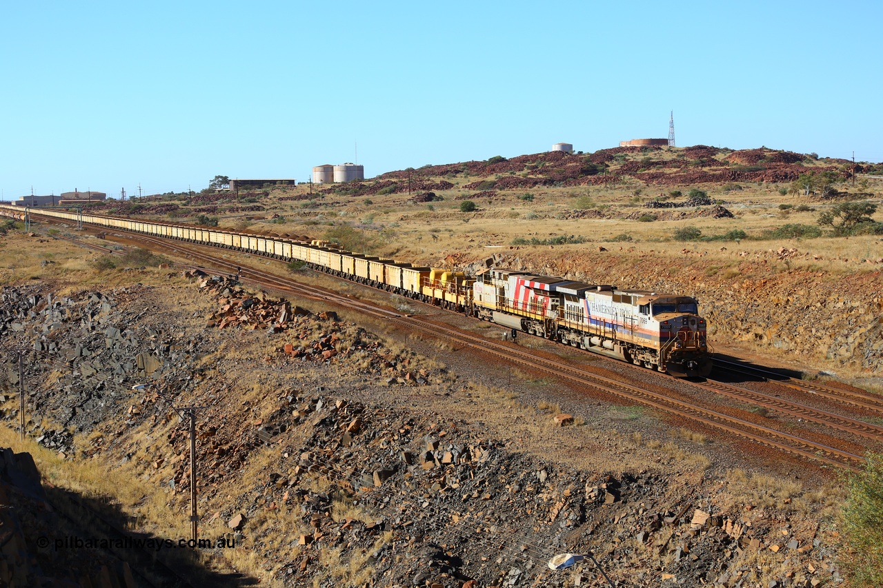 170729 0322
Parker Point, an empty train is worked back towards Seven Mile yard along the Empty Car Line behind General Electric built Dash 9-44CW unit 7069 serial 47748 in the original Hamersley Iron livery from 1994 and ES44DCi unit 8195. 29th July 2017. [url=https://goo.gl/maps/26rFPJ7MdWK2]GeoData[/url].
Keywords: 7069;GE;Dash-9-44CW;47748;