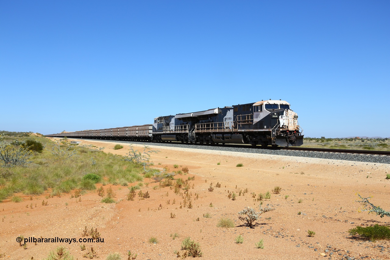 170730 0511
Indee, a loaded Roy Hill train runs along at the 71 km heading to the port behind General Electric built ES44ACi units RHA 1010 serial 62582 and RHA 1004 with 224 waggons and a mid-train remote in the middle. 30th July 2017. [url=https://goo.gl/maps/4pcTwmi7BmF2]GeoData[/url].
Keywords: RHA-class;RHA1010;GE;ES44ACi;62582;
