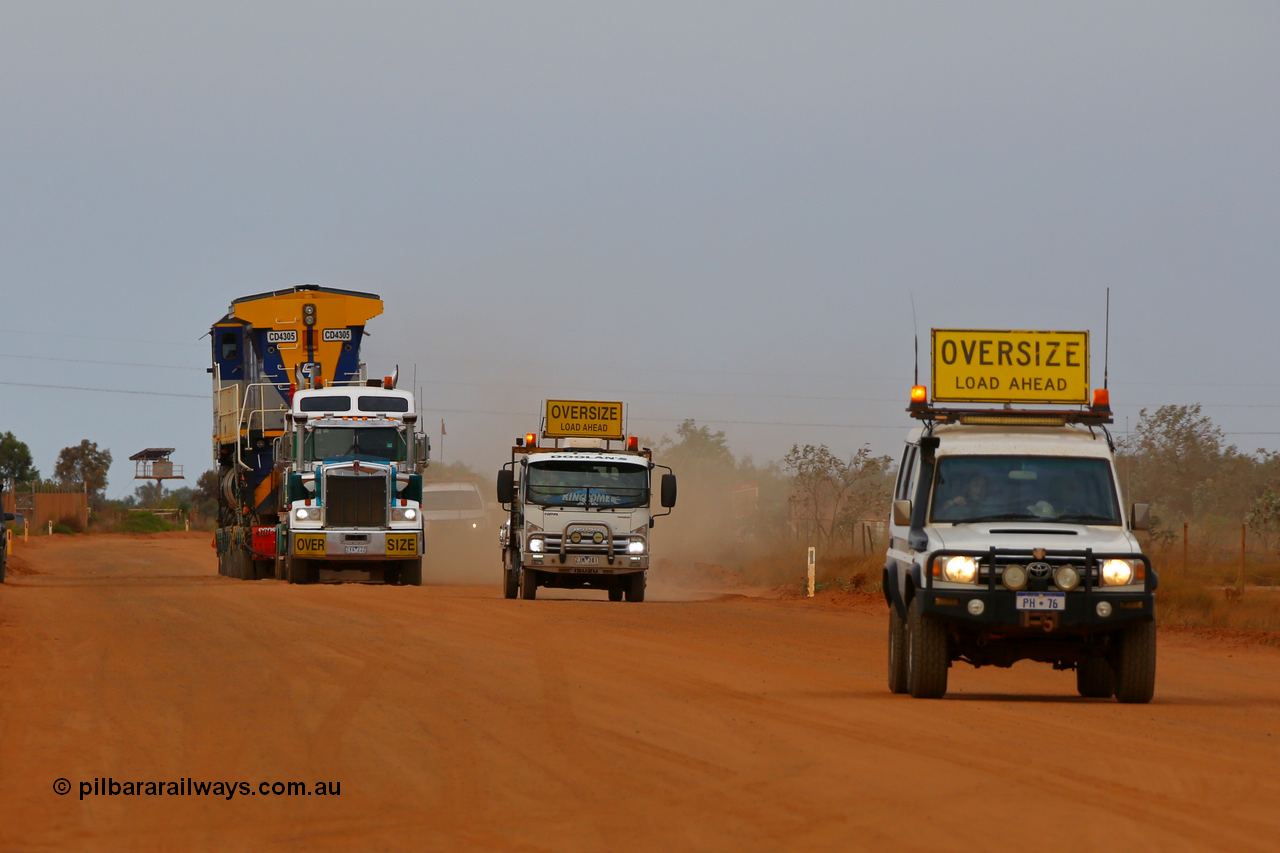 171204 1030r
Twelve Mile Creek Rd, CFCLA's Goninan ALCo to GE rebuild CM40-8M locomotive CD 4305 serial 8109-3/91-119 was originally Chesapeake & Ohio (USA) ALCo C630 serial 3486-4 #2103, then Robe River unit 9420 before going to CFCLA in 2012. Being transported to Roy Hill's flash butt yard by Doolan's Heavy Haulage. 4th December 2017. [url=https://goo.gl/maps/DSDSuorCwto]View map here[/url].
Keywords: CD-class;CD4305;CFCLA;Goninan;GE;CM40-8M;8109-3/91-119;9420;rebuild;ALCo;Schenectady-NY;C630;C+O2103;3486-4;
