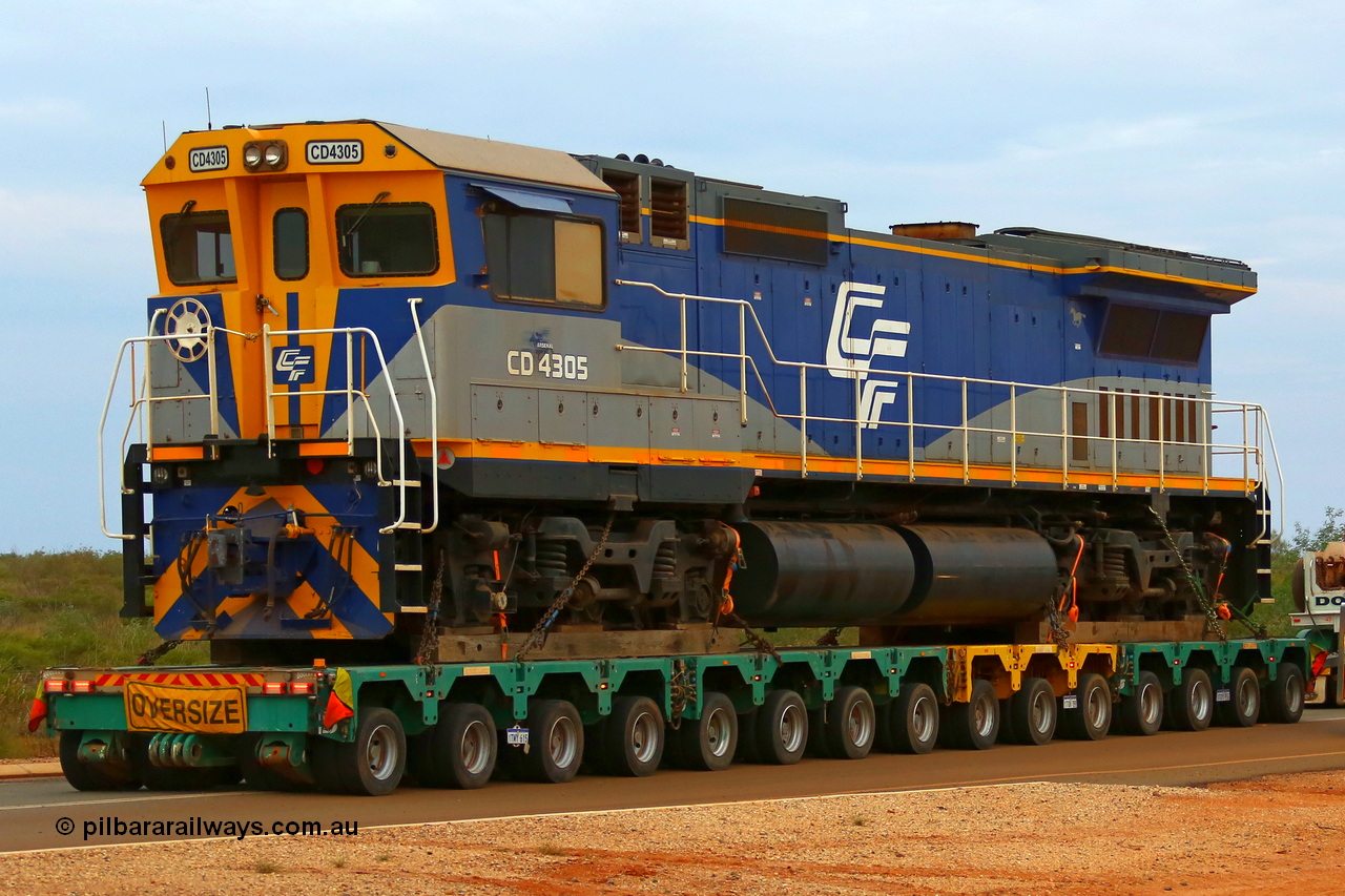 171204 1086r
CFCLA's Goninan ALCo to GE rebuild CM40-8M locomotive CD 4305, serial 8109-3/91-119 was originally Chesapeake & Ohio (USA) ALCo C630 serial 3486-4 #2103, then Robe River unit 9420 before going to CFCLA in 2012. Seen here on the access road while being transported to Roy Hill's flash butt yard by Doolan's Heavy Haulage, 4th December 2017. [url=https://goo.gl/maps/AvNLvqFCuJx]View map here[/url].
Keywords: CD-class;CD4305;CFCLA;Goninan;GE;CM40-8M;8109-3/91-119;9420;rebuild;ALCo;Schenectady-NY;C630;C+O2103;3486-4;