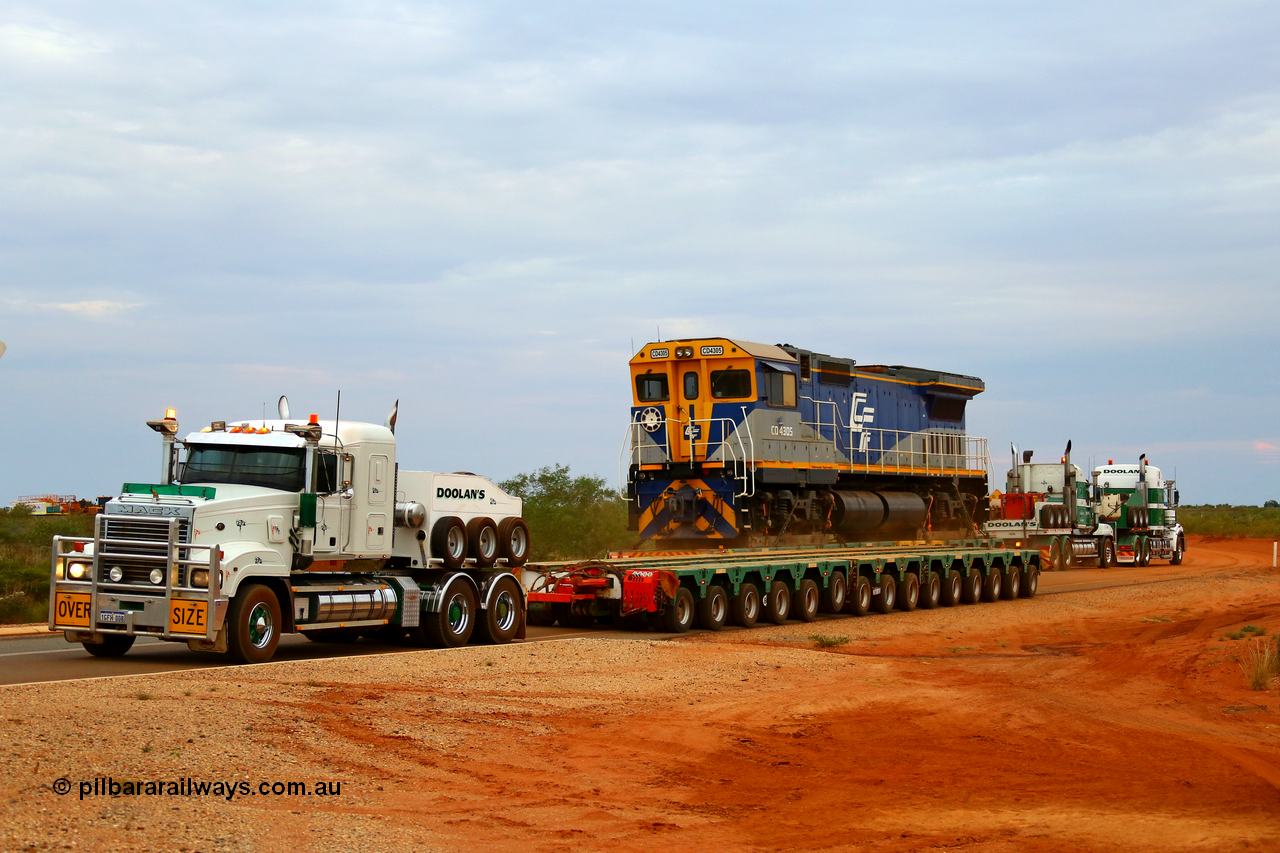 171204 1089r
CFCLA's Goninan ALCo rebuild to GE CM40-8M locomotive CD 4305, serial 8109-3/91-119 was originally Chesapeake & Ohio (USA) ALCo C630 serial 3486-4 #2103, then Robe River unit 9420 before going to CFCLA in 2012. Seen here on the access road while being transported to Roy Hill's flash butt yard by Doolan's Heavy Haulage as they pass an empty float, 4th December 2017. [url=https://goo.gl/maps/AvNLvqFCuJx]View map here[/url].
Keywords: CD-class;CD4305;CFCLA;Goninan;GE;CM40-8M;8109-3/91-119;9420;rebuild;ALCo;Schenectady-NY;C630;C+O2103;3486-4;