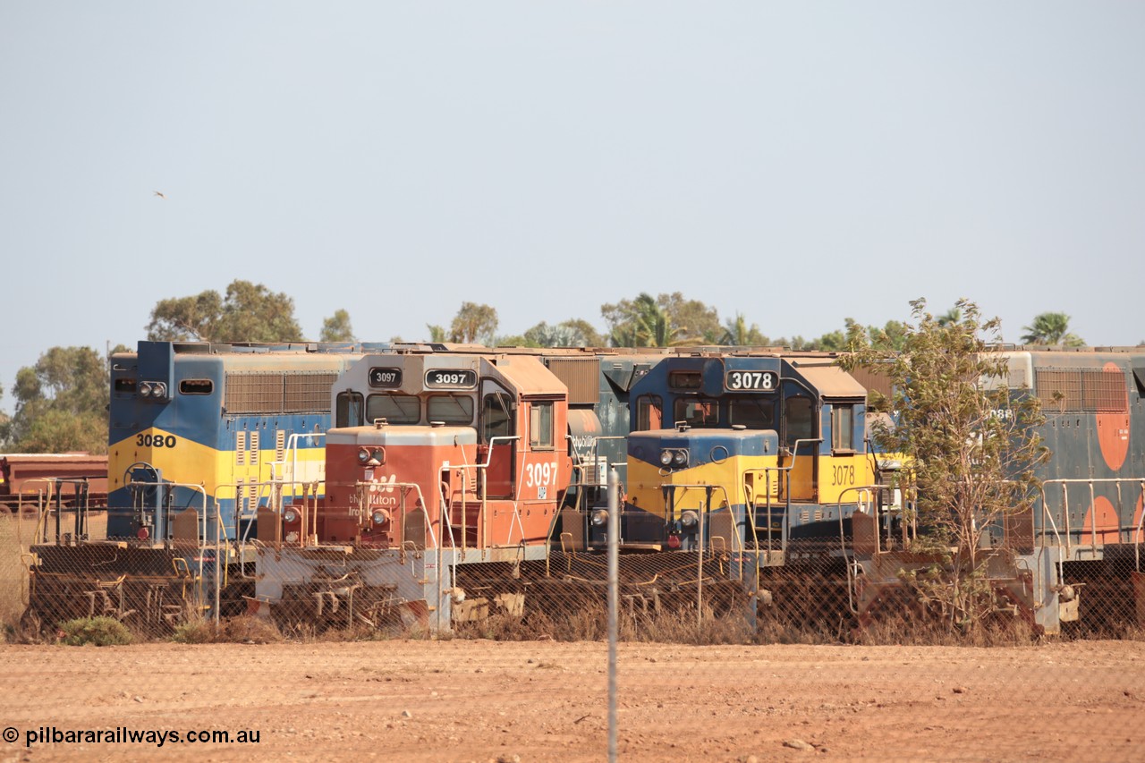 141025 5819
Wedgefield, WA, view from the new bypass road looking into the rear of Sell and Parker's metal recycling yard with former BHP Billiton Iron Ore EMD SD40 and SD40R model units lined up awaiting their fate, from left, SD40 3080, SD40R 3097, SD40 3078 and SD40R 3088.
Keywords: S+P;3080;3097;3078;EMD;SD40;SD40R;33674/7083-4;31569/7875-10;31503/7861-13;