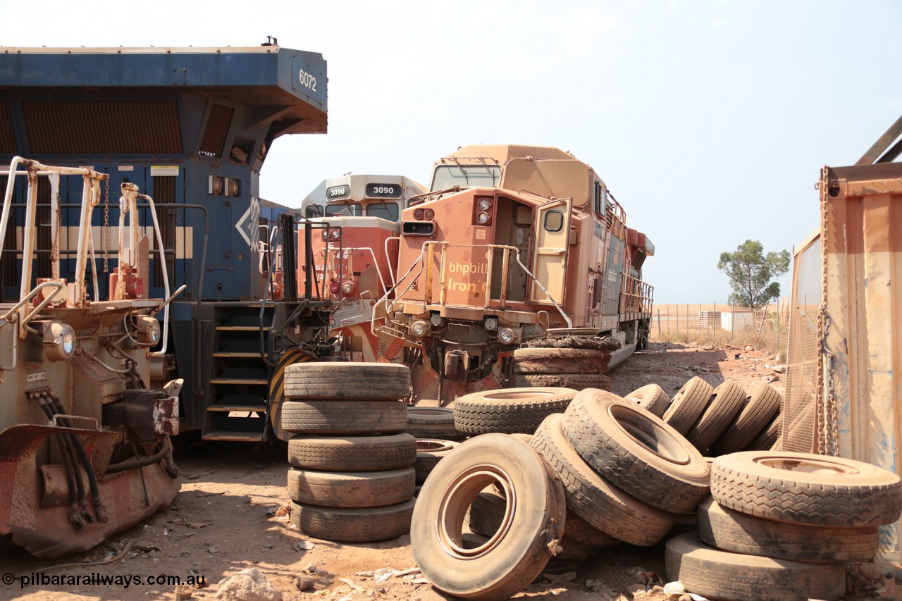 141027 5846
Wedgefield, Sell and Parker's metal recycling yard sees redundant BHP Billiton GE AC6000 locomotives 6076 in the bubble paint livery and 6072 in the blue and white livery flanked by EMD SD40R units with 3090 visible beside 6076 their days numbered since being the largest locomotives to operate in Australia, they being destined for nothing more than scrap.
Keywords: 6076;GE;AC6000;51068;