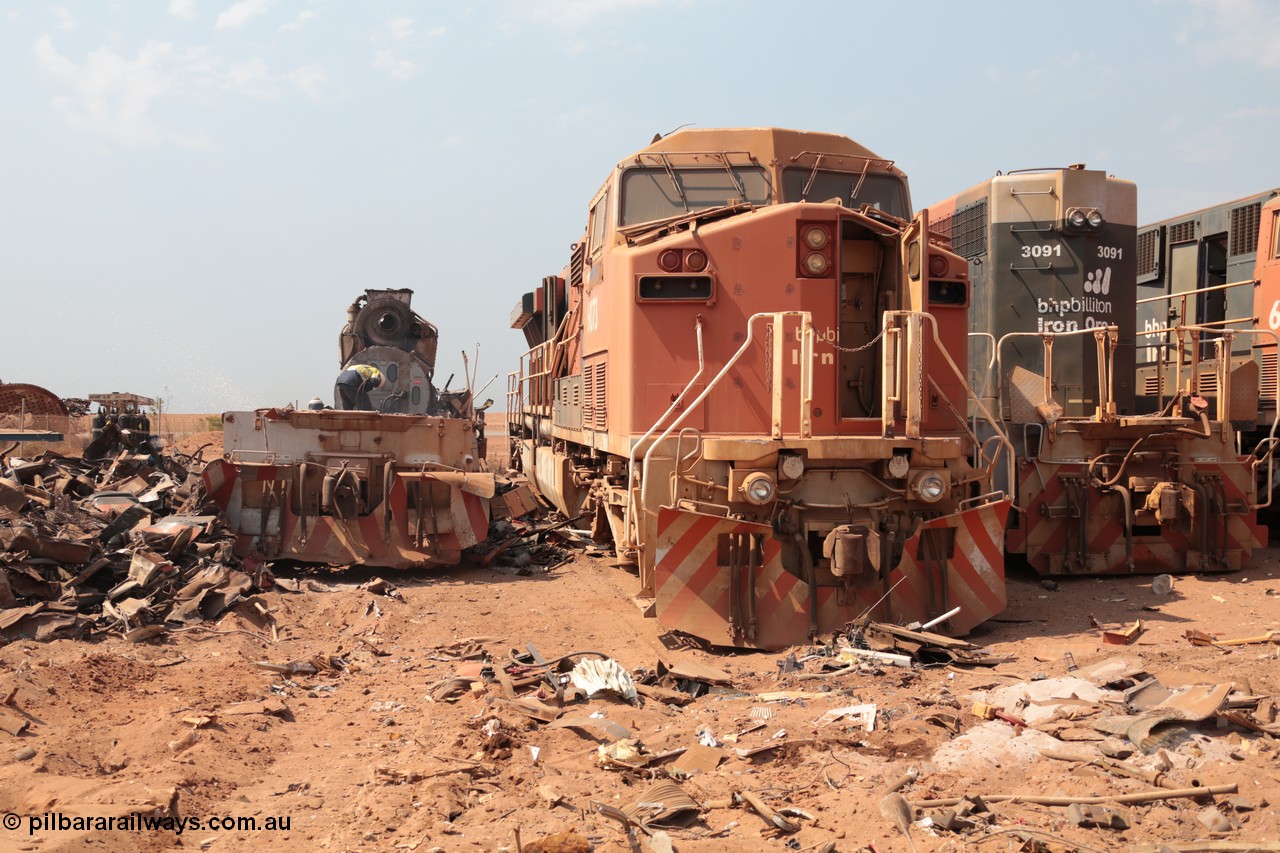 141027 5875
Wedgefield, Sell and Parker's metal recycling yard, General Electric AC6000 unit 6073 serial 51065 and EMD SD40R unit 3091 serial 31496/7861-6 look on as another SD40R unit is reduced to its frame and EMD 645 engine.
Keywords: 6073;GE;AC6000;51065;3091;EMD;SD40R;31496/7861-6;