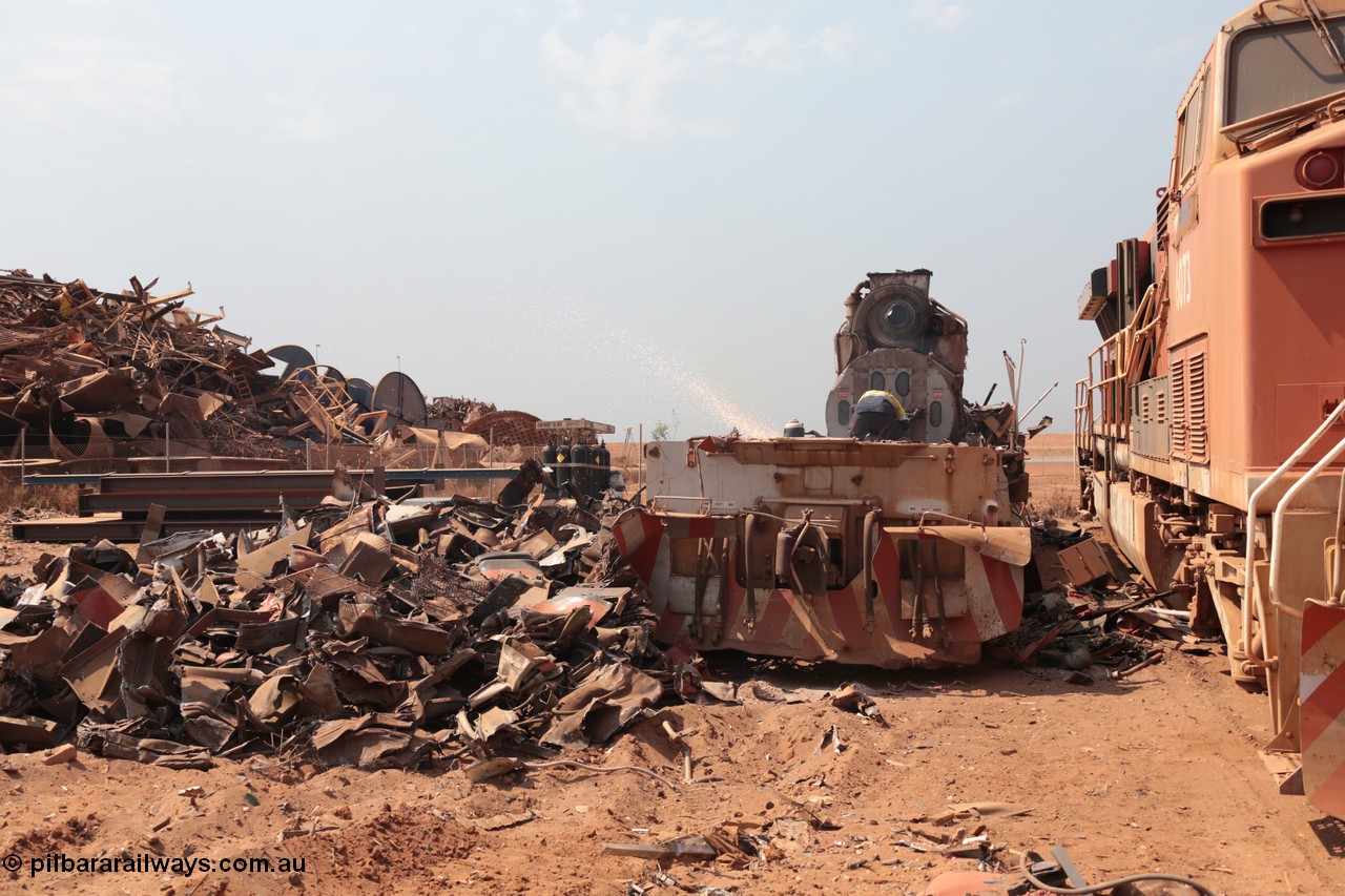 141027 5879
Wedgefield, Sell and Parker's metal recycling yard, the frame of an EMD SD40R unit is thermal lanced around the EMD 645 engine and alternator.
Keywords: EMD;SD40R;