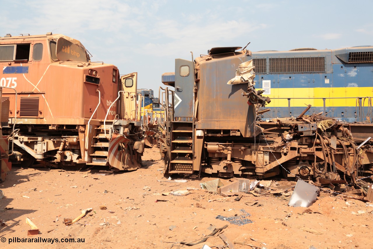 141027 5880
Wedgefield, Sell and Parker's metal recycling yard, General Electric AC6000 units 6075 serial 51067 is nose to nose with the remains of sister unit 6071 serial 51063.
Keywords: S+P;6075;GE;AC6000;51067;6071;51063;
