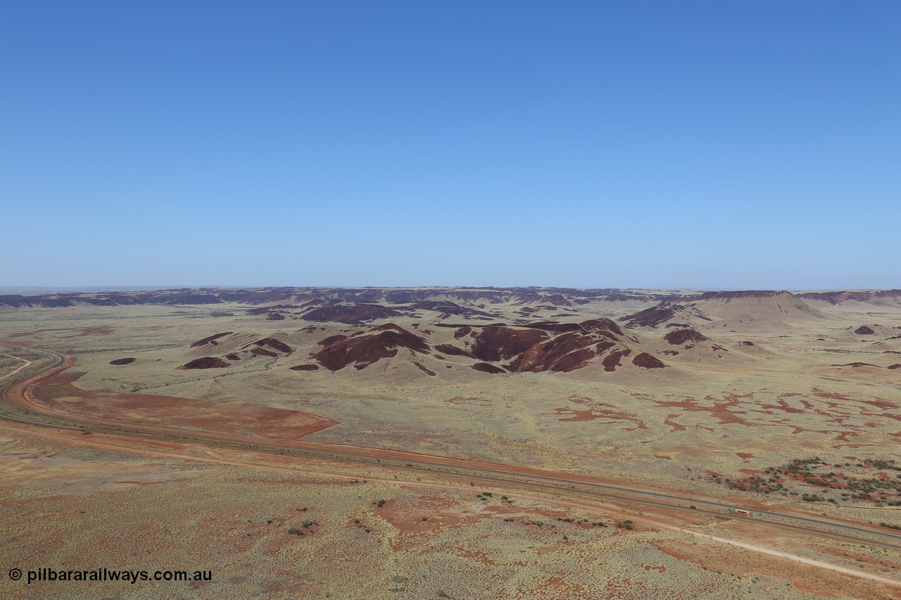 151111 9506
A view from Table Hill looking south west across the Robe River rail line and the rolling hills and mesas.
