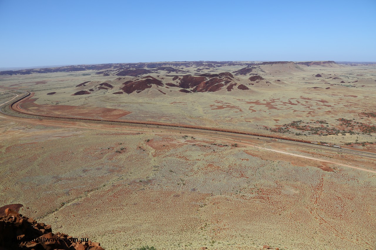 151111 9526
A loaded train behind General Electric ES44DCi units 8113 serial 59105 in the original silver livery and 8145 serial 58726 in the tiger strip Rio livery and Dash 9-44CW 9433 serial 54766 in ROBE Pilbara Iron livery runs along on the West Mainline bound for Cape Lambert viewed from Table Hill.
Keywords: 8113;GE;ES44DCi;59105;