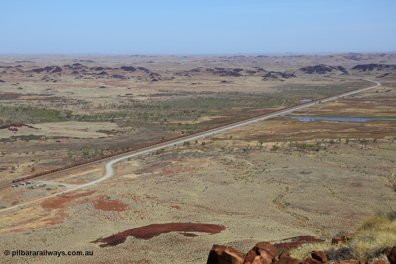 151111 9532
A loaded train behind General Electric ES44DCi units 8113 serial 59105 in the original silver livery and 8145 serial 58726 in the tiger strip Rio livery and Dash 9-44CW 9433 serial 54766 in ROBE Pilbara Iron livery runs along on the West Mainline bound for Cape Lambert viewed from Table Hill.
Keywords: 8113;GE;ES44DCi;59105;