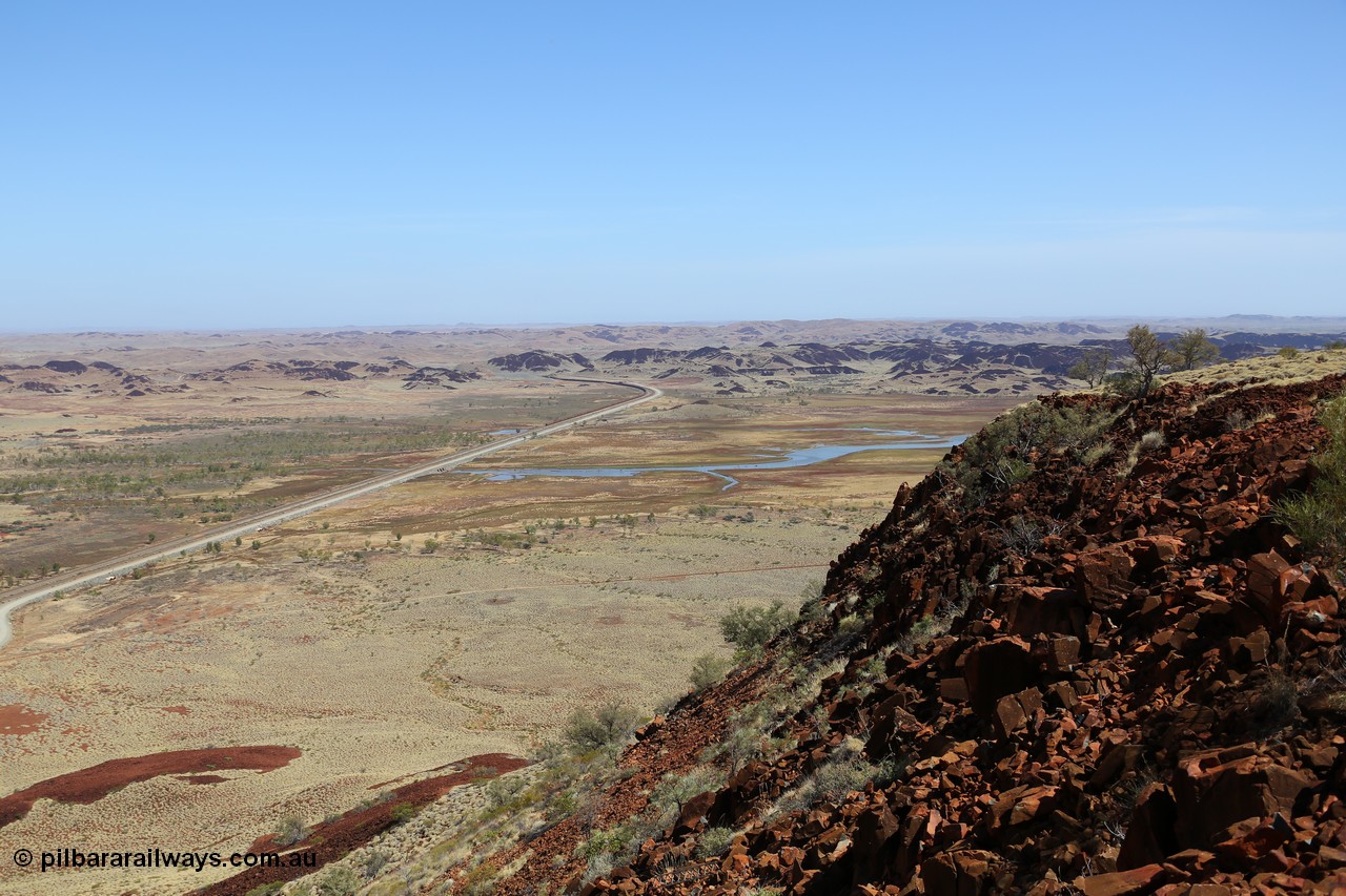 151111 9534
A view from Table Hill looking north-north west with a loaded train on the Lake Poongkaliyarra causeway and heading through Lockyer Gap bound for Cape Lambert.
